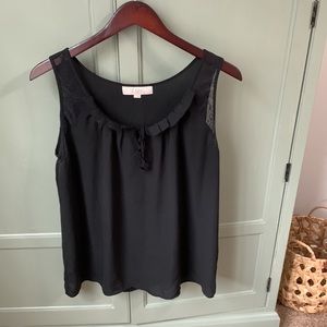 Black sleeveless blouse